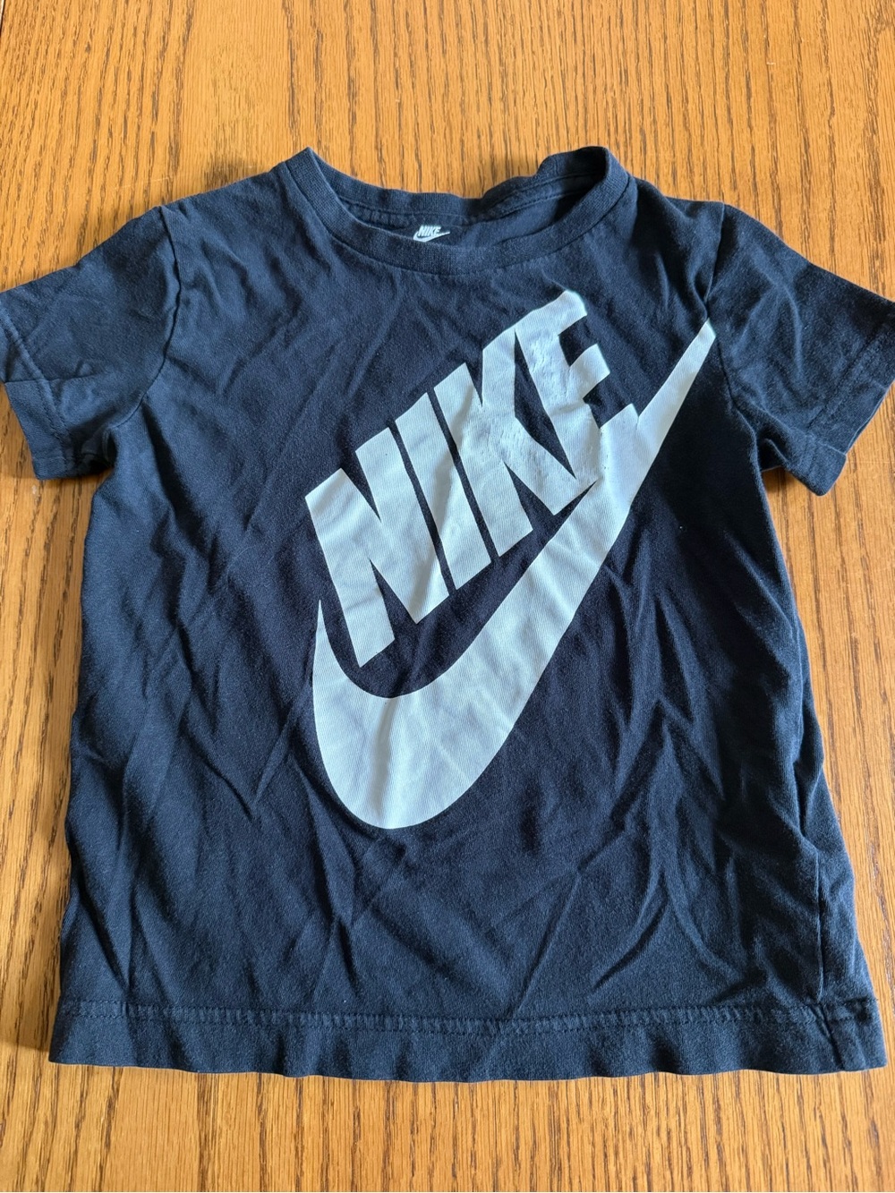 Nike Kids Black T-Shirt with Large White Swoosh Logo